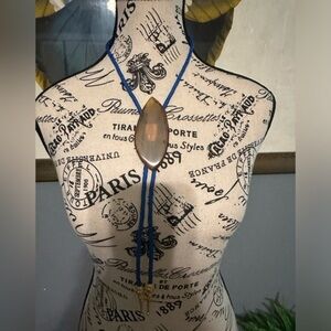 Bennet patent pending bolo tie with agate stone. Silver tone roadrunner. Vintage